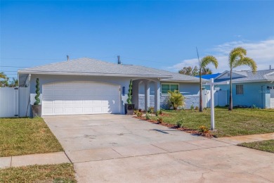 Welcome to your dream home, perfectly situated just moments from on Mangrove Bay Golf Course in Florida - for sale on GolfHomes.com, golf home, golf lot