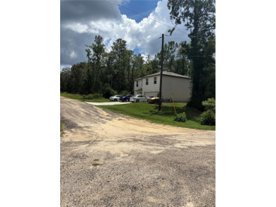 Nestled in the heart of Citrus Springs, this residential on El Diablo Golf and Country Club in Florida - for sale on GolfHomes.com, golf home, golf lot
