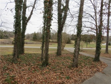 This sprawling brick ranch is in the perfect location! Minutes on Cherokee Golf and Country Club in Georgia - for sale on GolfHomes.com, golf home, golf lot