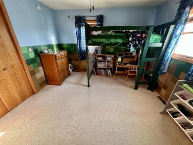 Discover this remarkable, multi~level walkout home nestled on a on The Meadows Country Club in Iowa - for sale on GolfHomes.com, golf home, golf lot