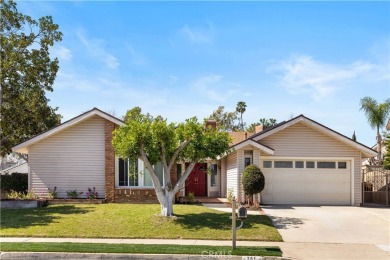 Attractive single story on a corner lot is ready for you! This on Alta Vista Country Club in California - for sale on GolfHomes.com, golf home, golf lot