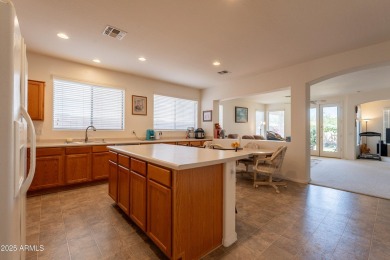 This beautiful home is on a cul-de-sac and has a rock front on on The Golf Club At Johnson Ranch in Arizona - for sale on GolfHomes.com, golf home, golf lot