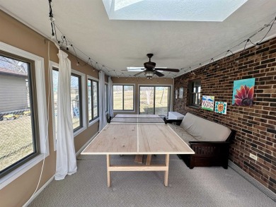 Discover this remarkable, multi~level walkout home nestled on a on The Meadows Country Club in Iowa - for sale on GolfHomes.com, golf home, golf lot