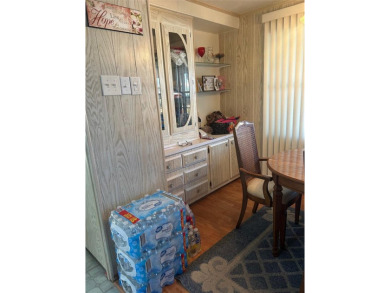 READY TO GO!  This spacious Florida home is ready for a new on Largo Golf Course in Florida - for sale on GolfHomes.com, golf home, golf lot