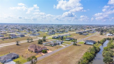 Comfort, convenience, and potential await a savvy homeowner or on Burnt Store Golf Club in Florida - for sale on GolfHomes.com, golf home, golf lot