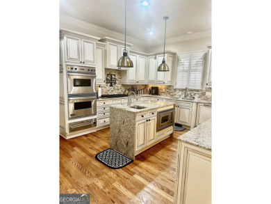 INSTANT EQUITY! Here lies a rare breed of comfort and elegance on The Governors Towne Club in Georgia - for sale on GolfHomes.com, golf home, golf lot