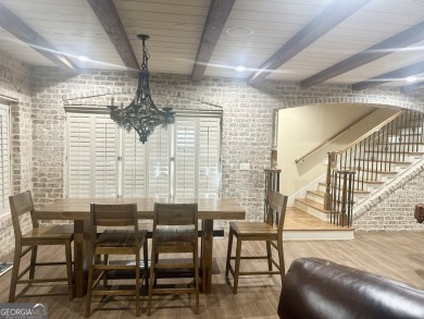 INSTANT EQUITY! Here lies a rare breed of comfort and elegance on The Governors Towne Club in Georgia - for sale on GolfHomes.com, golf home, golf lot