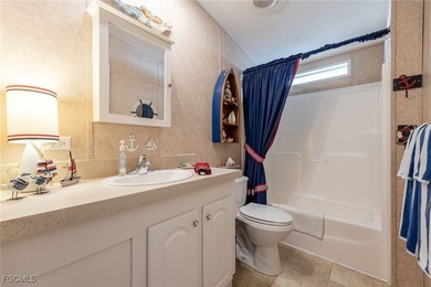 Welcome to your dream home in Six Lakes Country Club! This on Six Lakes Country Club in Florida - for sale on GolfHomes.com, golf home, golf lot