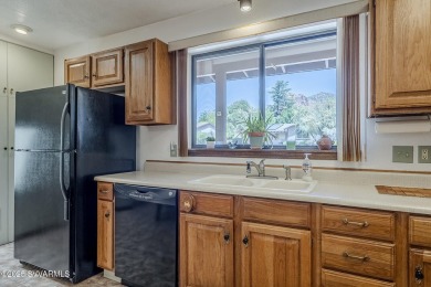 This charming 3-bedroom, 2-bath home offers red rock views and on Sedona Golf Resort in Arizona - for sale on GolfHomes.com, golf home, golf lot