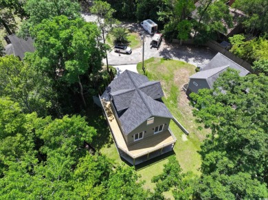 Welcome to 1673 Carriage Ln in Little River, SC -- a modern on Glen Dornoch Waterway Golf Links in South Carolina - for sale on GolfHomes.com, golf home, golf lot