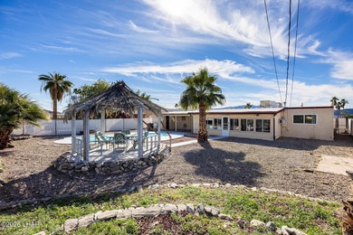 Located in the heart of Lake Havasu City, this 3bedroom, 2bath on London Bridge Golf Course in Arizona - for sale on GolfHomes.com, golf home, golf lot
