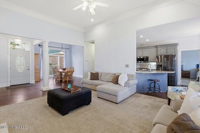 Perfectly positioned along the 10th fairway of Bay Pointe Golf on Bay Pointe Golf and Resort in Mississippi - for sale on GolfHomes.com, golf home, golf lot