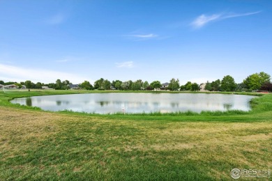 Welcome Home! Backed by open space with a tranquil pond view on Eaton Country Club in Colorado - for sale on GolfHomes.com, golf home, golf lot