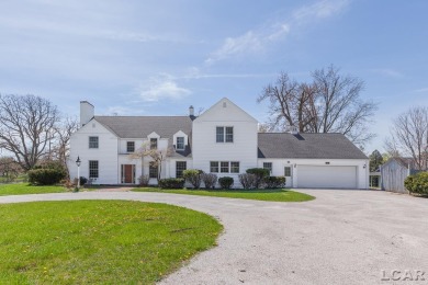 This Historic residence is nestled atop a wonderful vista on Lenawee Country Club in Michigan - for sale on GolfHomes.com, golf home, golf lot