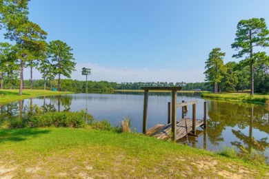 1.3+ acre Waterfront AND Golf Course view lot in Country Club on Hattiesburg Country Club in Mississippi - for sale on GolfHomes.com, golf home, golf lot