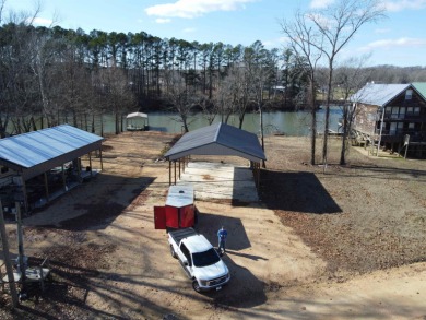 Water front dockable camper lot in gated subdivision. Water on Tennessee River Golf Club in Tennessee - for sale on GolfHomes.com, golf home, golf lot