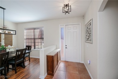 Welcome to this beautifully updated 4-bedroom, 3-bath pool home on Gateway Golf and Country Club in Florida - for sale on GolfHomes.com, golf home, golf lot