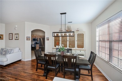 Welcome to this beautifully updated 4-bedroom, 3-bath pool home on Gateway Golf and Country Club in Florida - for sale on GolfHomes.com, golf home, golf lot