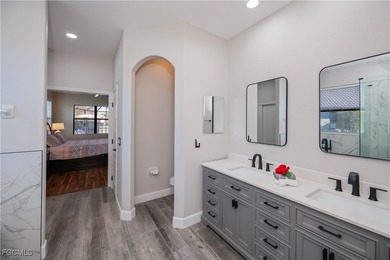 Welcome to this beautifully updated 4-bedroom, 3-bath pool home on Gateway Golf and Country Club in Florida - for sale on GolfHomes.com, golf home, golf lot