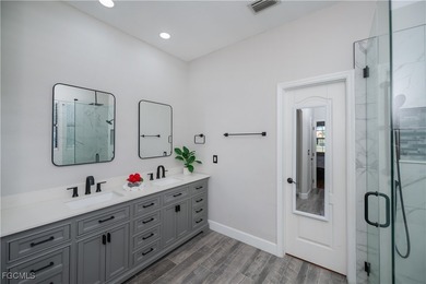 Welcome to this beautifully updated 4-bedroom, 3-bath pool home on Gateway Golf and Country Club in Florida - for sale on GolfHomes.com, golf home, golf lot