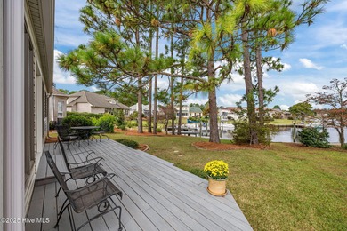 This beautifully designed home offers breathtaking water views on Harbour Point Golf Club in North Carolina - for sale on GolfHomes.com, golf home, golf lot