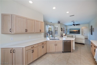 Welcome to this beautifully updated 4-bedroom, 3-bath pool home on Gateway Golf and Country Club in Florida - for sale on GolfHomes.com, golf home, golf lot