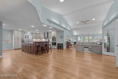 This beautifully designed home offers breathtaking water views on Harbour Point Golf Club in North Carolina - for sale on GolfHomes.com, golf home, golf lot
