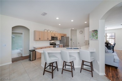 Welcome to this beautifully updated 4-bedroom, 3-bath pool home on Gateway Golf and Country Club in Florida - for sale on GolfHomes.com, golf home, golf lot