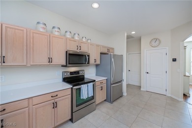 Welcome to this beautifully updated 4-bedroom, 3-bath pool home on Gateway Golf and Country Club in Florida - for sale on GolfHomes.com, golf home, golf lot