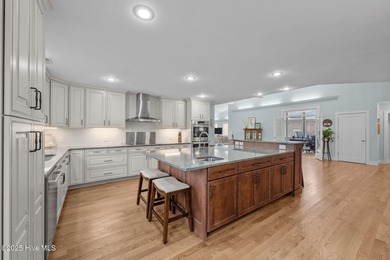 This beautifully designed home offers breathtaking water views on Harbour Point Golf Club in North Carolina - for sale on GolfHomes.com, golf home, golf lot