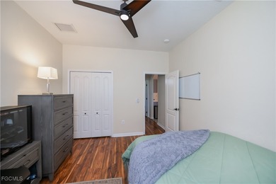 Welcome to this beautifully updated 4-bedroom, 3-bath pool home on Gateway Golf and Country Club in Florida - for sale on GolfHomes.com, golf home, golf lot