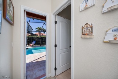 Welcome to this beautifully updated 4-bedroom, 3-bath pool home on Gateway Golf and Country Club in Florida - for sale on GolfHomes.com, golf home, golf lot