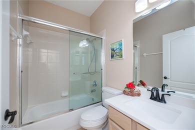 Welcome to this beautifully updated 4-bedroom, 3-bath pool home on Gateway Golf and Country Club in Florida - for sale on GolfHomes.com, golf home, golf lot