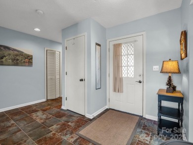 Stunning 2 bedroom/2 bathroom condo overlooking the golf course! on Rumbling Bald Resort on Lake Lure in North Carolina - for sale on GolfHomes.com, golf home, golf lot