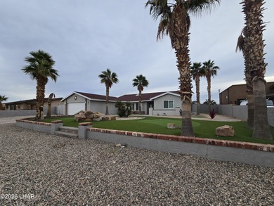 Gorgeous home in a great location with nice views and own Golf on London Bridge Golf Course in Arizona - for sale on GolfHomes.com, golf home, golf lot