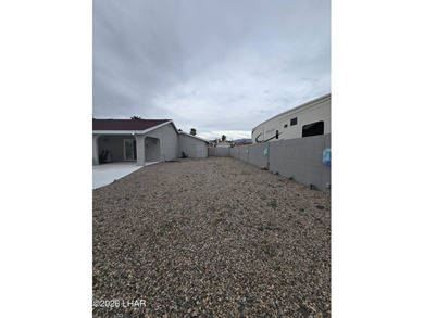 Gorgeous home in a great location with nice views and own Golf on London Bridge Golf Course in Arizona - for sale on GolfHomes.com, golf home, golf lot