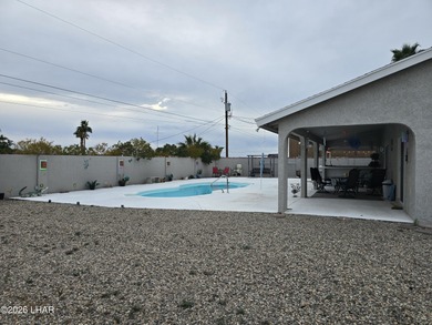 Gorgeous home in a great location with nice views and own Golf on London Bridge Golf Course in Arizona - for sale on GolfHomes.com, golf home, golf lot