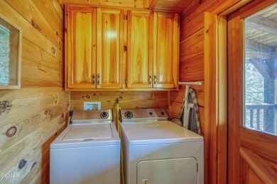 Charming True Log Cabin in Cobbly Nob - Your Mountain Retreat on Bent Creek Golf Course in Tennessee - for sale on GolfHomes.com, golf home, golf lot