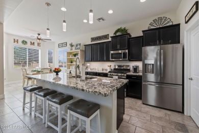 Welcome to this beautifully maintained home located in the on Quail Wood Greens Golf Course in Arizona - for sale on GolfHomes.com, golf home, golf lot