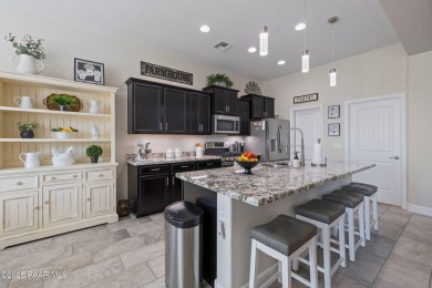 Welcome to this beautifully maintained home located in the on Quail Wood Greens Golf Course in Arizona - for sale on GolfHomes.com, golf home, golf lot