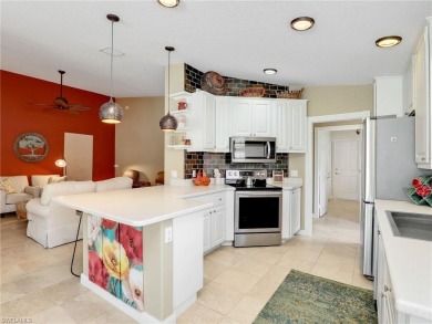 Discover this inviting, fully furnished VillageWalk of Bonita on Palmira Golf and Country Club in Florida - for sale on GolfHomes.com, golf home, golf lot