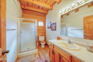 Charming True Log Cabin in Cobbly Nob - Your Mountain Retreat on Bent Creek Golf Course in Tennessee - for sale on GolfHomes.com, golf home, golf lot