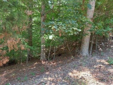 Your chance to own some beautiful, wooded property in the on Baneberry Golf and Resort Club in Tennessee - for sale on GolfHomes.com, golf home, golf lot