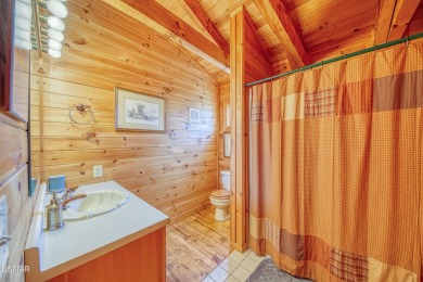 Charming True Log Cabin in Cobbly Nob - Your Mountain Retreat on Bent Creek Golf Course in Tennessee - for sale on GolfHomes.com, golf home, golf lot