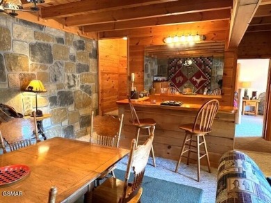 Charming True Log Cabin in Cobbly Nob - Your Mountain Retreat on Bent Creek Golf Course in Tennessee - for sale on GolfHomes.com, golf home, golf lot