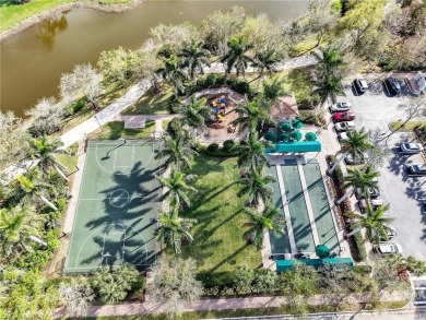 Discover this inviting, fully furnished VillageWalk of Bonita on Palmira Golf and Country Club in Florida - for sale on GolfHomes.com, golf home, golf lot