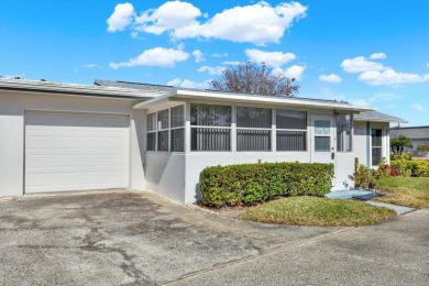 Take a peak into what resort-style living looks like in Palm on Highland Lakes Executive Golf Course in Florida - for sale on GolfHomes.com, golf home, golf lot