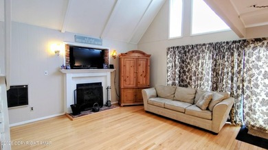 Escape to this cute-as-a-button 3-bedroom, 1-bath chalet with a on The Hideout Golf in Pennsylvania - for sale on GolfHomes.com, golf home, golf lot