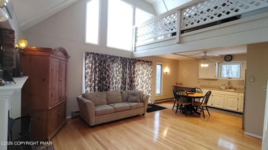 Escape to this cute-as-a-button 3-bedroom, 1-bath chalet with a on The Hideout Golf in Pennsylvania - for sale on GolfHomes.com, golf home, golf lot