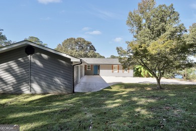 Lakefront Living in Turtle Cove!  Welcome to this stunning on Turtle Cove Golf Course in Georgia - for sale on GolfHomes.com, golf home, golf lot